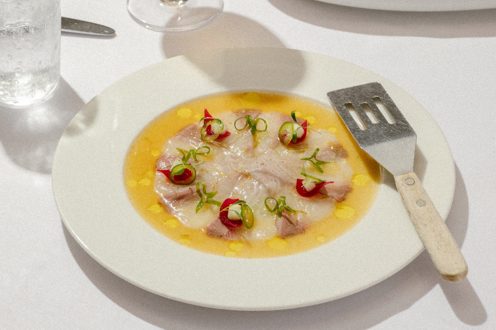 Yellowtail Carpaccio with Guacamole and Citrus Dressing.jpg